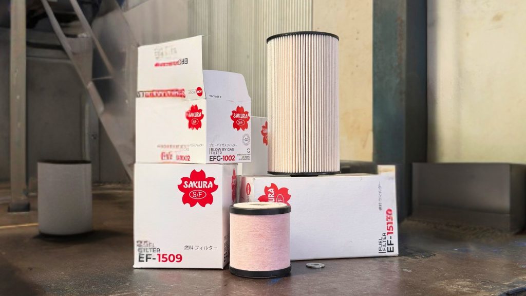 EWP servicing components including oil filter and maintenance parts ready for installation