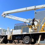 Truck mounted EWP with basket leaning indicating potential structural or stability issue