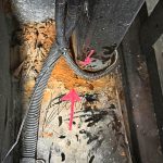 Corrosion and rust on an EWP component requiring closer inspection.
